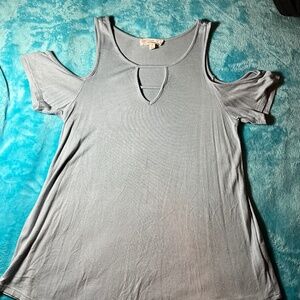 Woman’s cold shoulder top